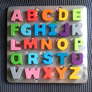 J’adore wooden alphabet puzzle. New, in original packaging.